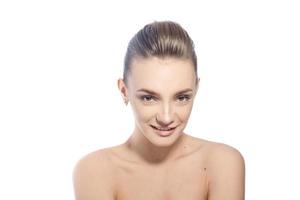 young lady with brown eyes smiling in studio photo