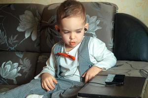 young boy listening to the music photo