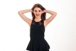 Cheerful brunette lady with red lips smiling on camera isolated on white background photo