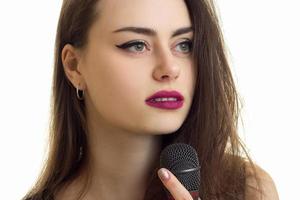 pretty woman sings a karaoke photo