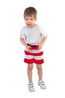 Little boy in a white t-shirt and shorts photo