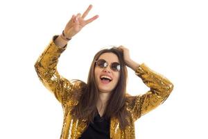 funny stylish woman in golden jacket and sunglasses photo