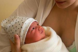 Mom and Her Little Newborn Girl photo