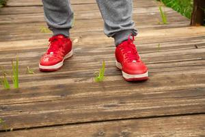 man stands on wooden floor photo