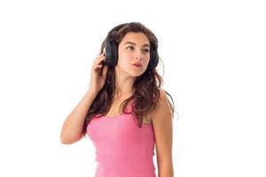 girl in headphones in studio photo