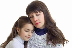 Portrait of a cute little girl with mother close-up photo