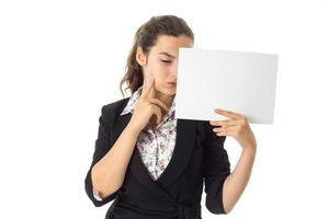 woman in uniform with white placard in hands photo