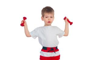 Little boy with a dumbbell photo