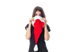 brunette girl in santa hat photo