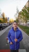 Woman takes morning jog through the city video