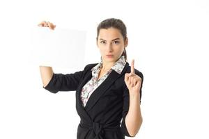 woman in uniform with white placard in hands photo