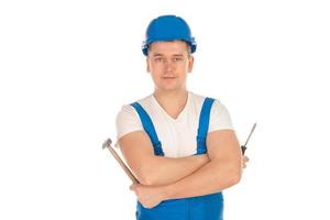 man builder looking at the camera in blue uniform photo