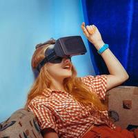 girl in virtual reality glasses photo