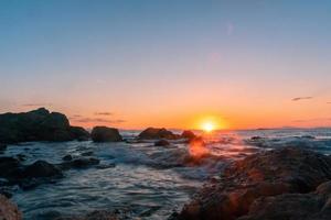beautiful sunset on the boundless sea, Rocky photo