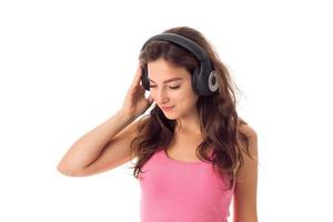 girl in headphones in studio photo