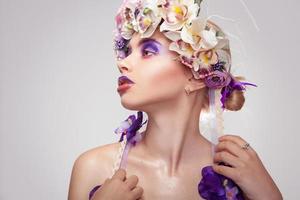 young girl with wreath on head photo