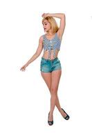 young blonde girl in casual clothes in studio photo