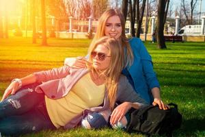 girls relaxing in the park photo