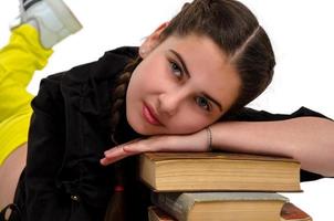 niña con libros foto