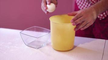 close up of the process of separating the whites and yolks video