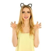 woman with cat ears posing in studio photo