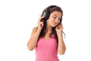 girl in headphones in studio photo