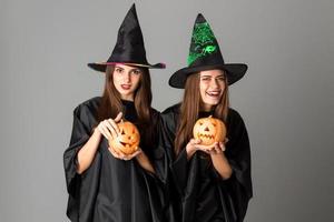 young women in halloween style clothes photo