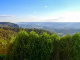 Blue Mountains National Park in Australia. Blue Mountains National Park is a vast region west of Sydney, Australia, and part of the Great Dividing Range. photo