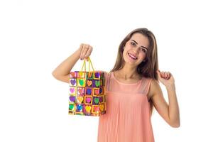 fun girl holding a beautiful color package photo