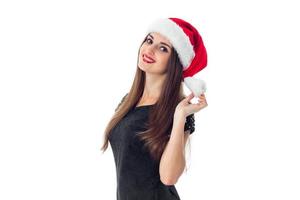 beauty brunette girl in santa hat photo