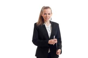 young business woman in black jacket looking directly and smiling photo