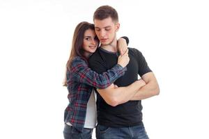 tender young girl tight hugs her boyfriend hands photo