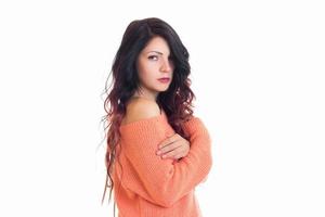 Portrait of a beautiful young girl with long wavy hair and the pink jacket photo