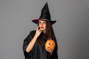 beautiful woman in halloween style clothes photo