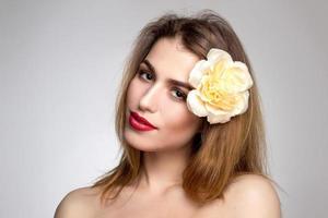 pretty girl in studio with red lips photo