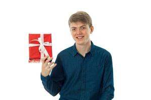 young man with gift in hand photo