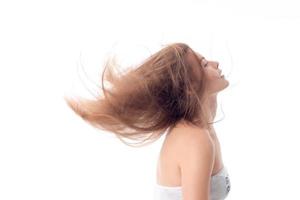 girl turned and her hair develop on air photo