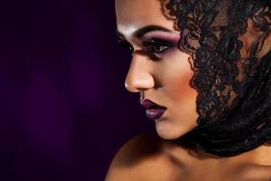 Elegance young adult woman looking away in studio photo