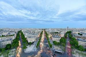 View of the Paris city skyline into the distance at dusk. photo