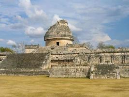 The El Caracol observatory temple in Chichen Itza. Ancient religious mayan ruins in Mexico. Remains of old indian civilization. photo