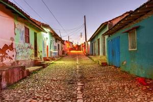 Colorful traditional houses in the colonial town of Trinidad in Cuba, a UNESCO World Heritage site. photo