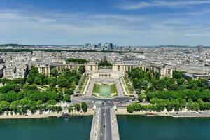 Aerial view of Trocadero as seen from the Eiffel Tower with La Defense in the background in Paris, France. photo