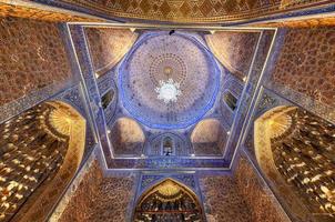 Samarkand, Uzbekistan - Jul 10, 2019 -  Gur-Emir Mausoleum of Tamerlane and his family in Samarkand, Uzbekistan. The building complex dates from the 15th century. photo