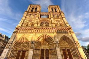 Notre-Dame de Paris, is a French Gothic medieval Catholic cathedral on the Ile de la Cite in the fourth arrondissement of Paris, France. photo