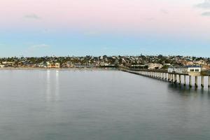 San Diego, California - July 23, 2020 -  Sunset by the Ocean Beach Pier in San Diego, California. photo