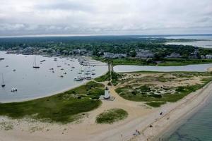 Edgartown Harbor Lighthouse at the entrance into Edgartown Harbor and Katama Bay, Martha's Vineyard, Massachusetts, USA. The historic lighthouse was built in 1828. photo