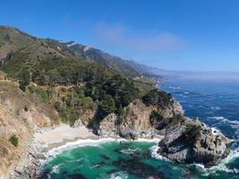 McWay Falls is an 80-foot-tall waterfall on the coast of Big Sur in central California photo