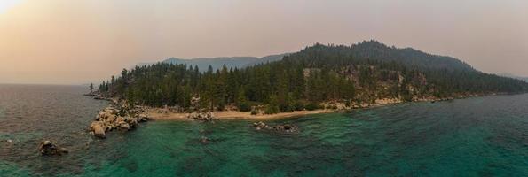 Secret Cove along Lake Tahoe in Nevada with a hazy sky due to nearby forest fires in California. photo