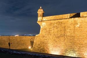 Castillo San Felipe del Morro also known as Fort San Felipe del Morro or Morro Castle at dusk. It is a 16th-century citadel located in San Juan, Puerto Rico. photo