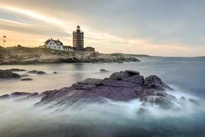 Portland Head Lighthouse in Cape Elizabeth, Maine. It is a historic lighthouse in Cape Elizabeth, Maine. Completed in 1791, it is the oldest lighthouse in the state of Maine. photo